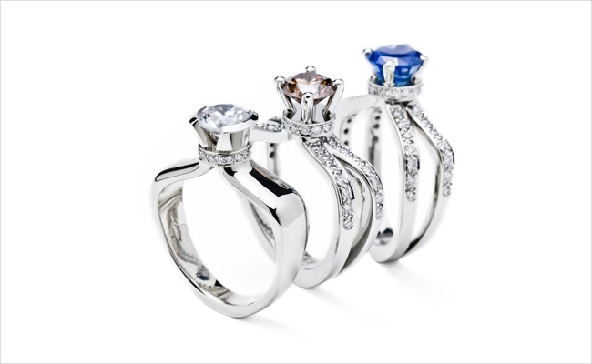The Perfume Bottle Collection.
Shown with round brilliant diamond, cognac diamond and blue sapphire.