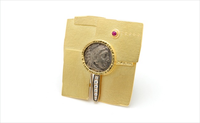 18k yellow gold multi-layered brooch, set with a genuine ancient coin, diamonds and a cabochon ruby