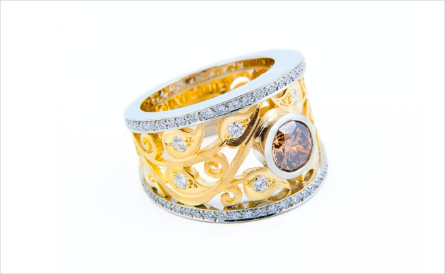Two-tone Filigree Ring with cinnamon diamond centre stone and pavé diamond rails