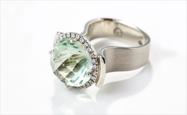 Green prasiolite ring in white gold with a diamond halo