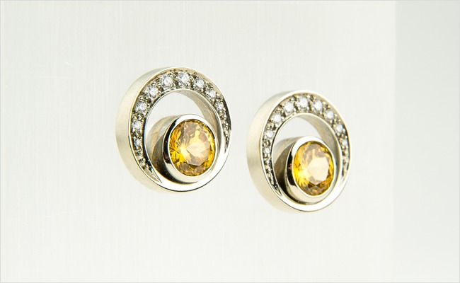 Golden zircon and diamond earrings