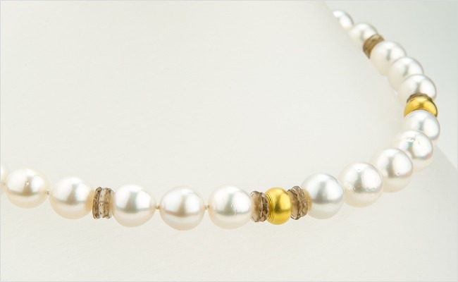 Strand of South Sea pearls with smoky quartz rondelles and hand-crafted yellow gold beads