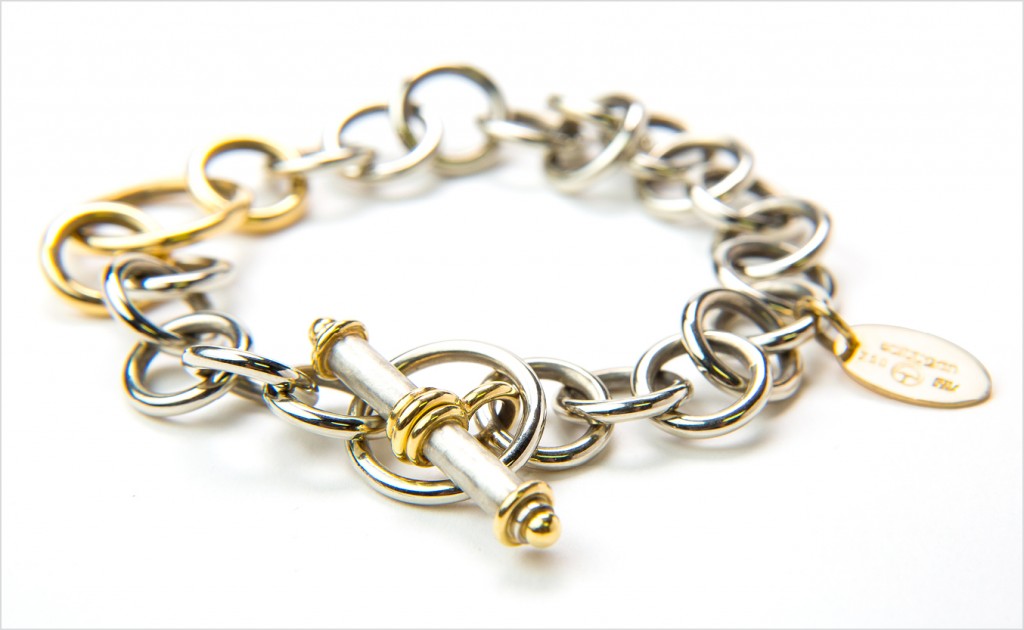 Stittgen’s signature toggle bracelet, handcrafted in 19k white gold with 18k yellow gold accents