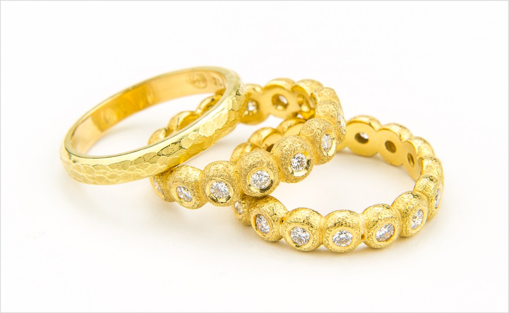 Diamond bands from The BB Collection, with a narrow hammered band, all in textured 18k yellow gold