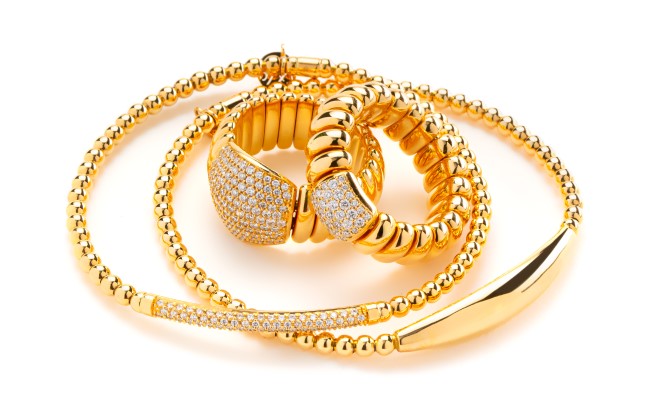 18K gold rings and bracelets with diamonds.  The stretch mechanism is warranted to last.