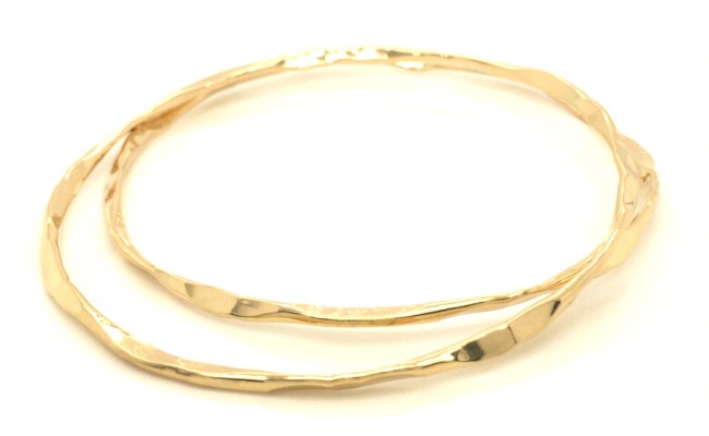 Handcrafted 18K gold bangles with hammered texture