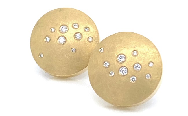Handcrafted button earrings in 18K gold, textured with a brushed finish and set with gypsy-set diamonds.